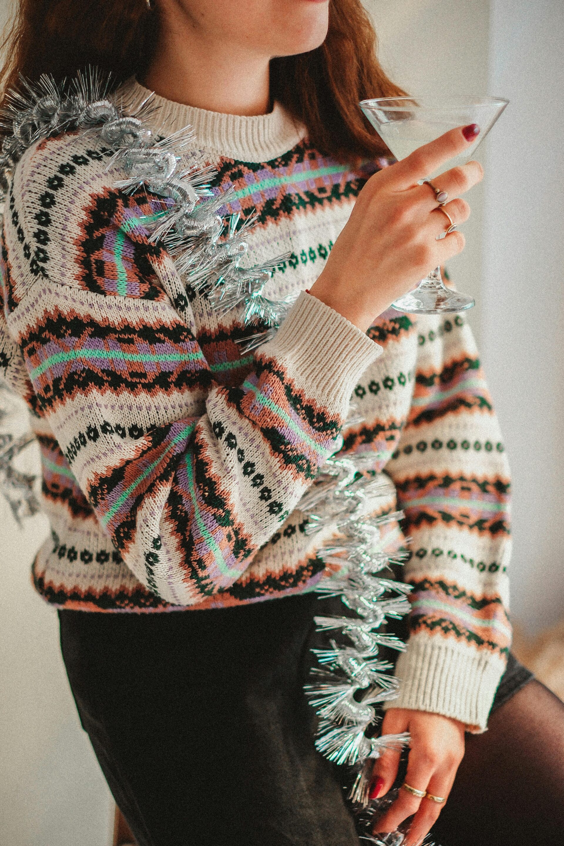 Colorful multi-pattern Jacquard festive knit pullover produced by Diamond Attires.