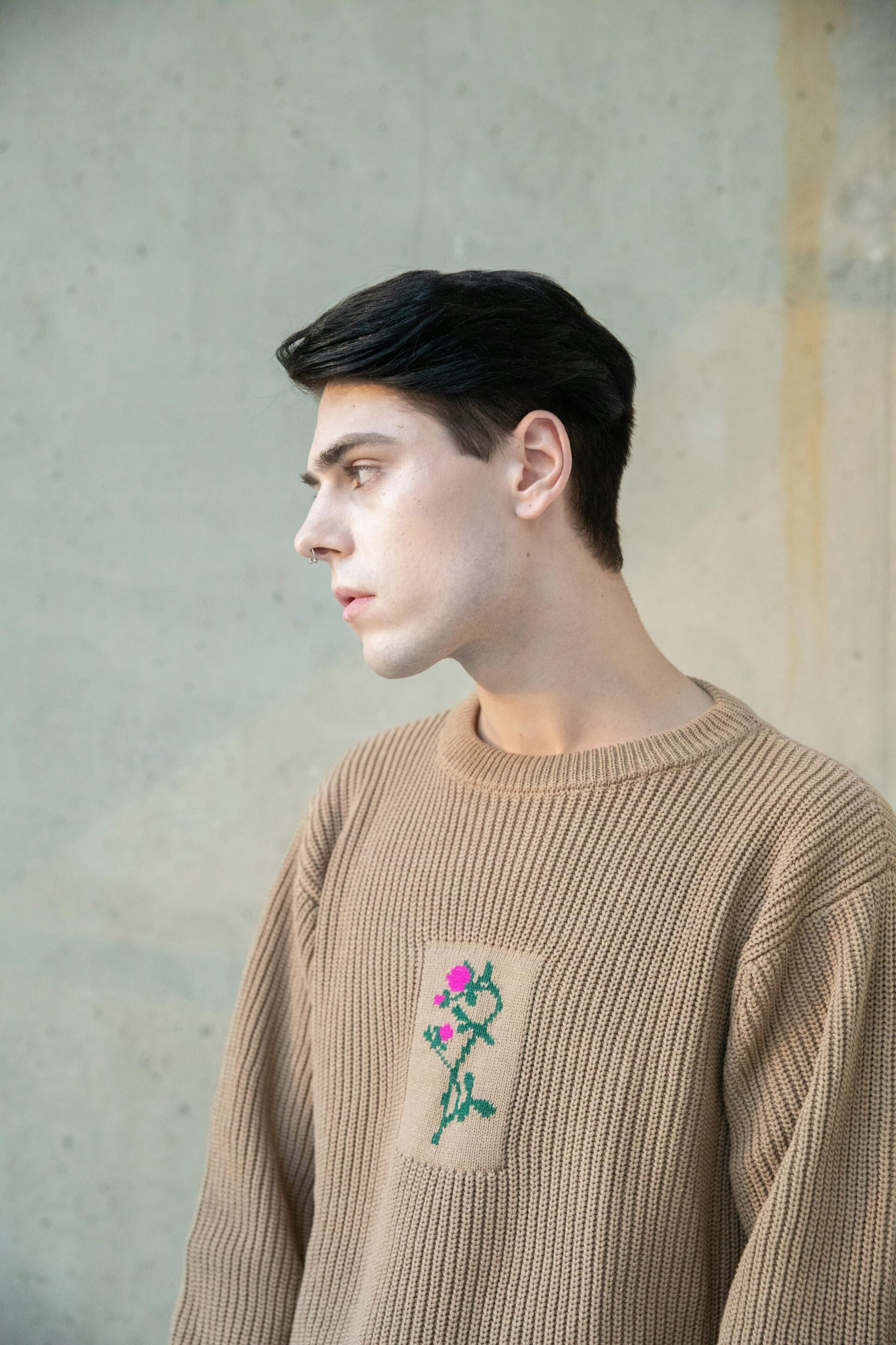 Men's cotton-blend sweater featuring a custom floral Intarsia graphic manufactured in Bangladesh.