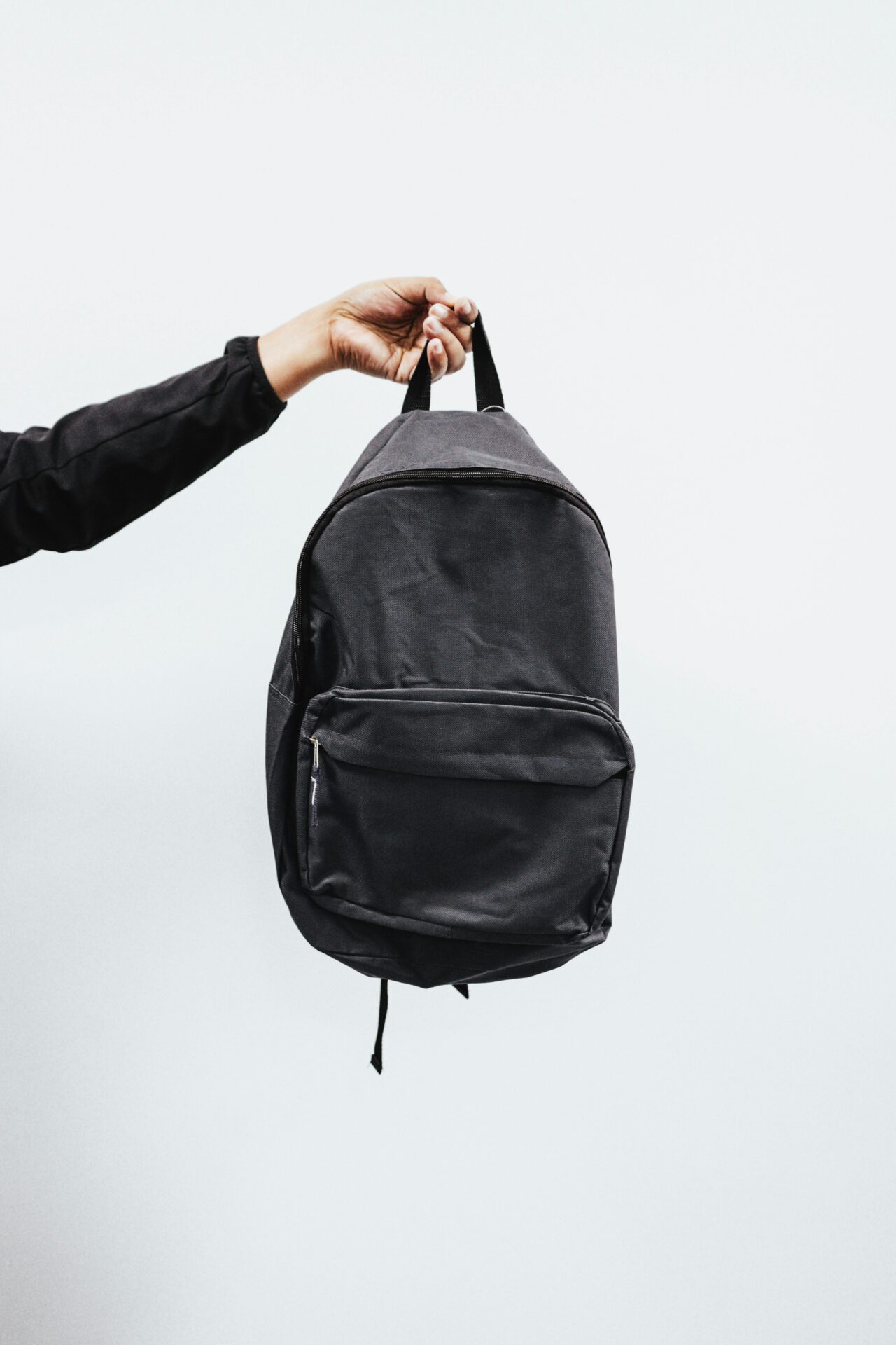 Minimalist charcoal grey canvas laptop backpack sourced and manufactured in Bangladesh.